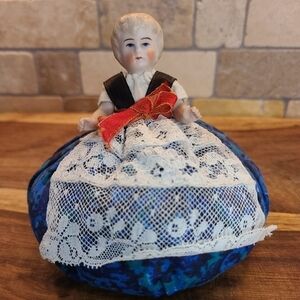 Antique German Porcelain Half Doll/ pin cushion doll with moving arms blue eyes